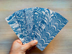 marbled cyanotype bookmarks with stencils